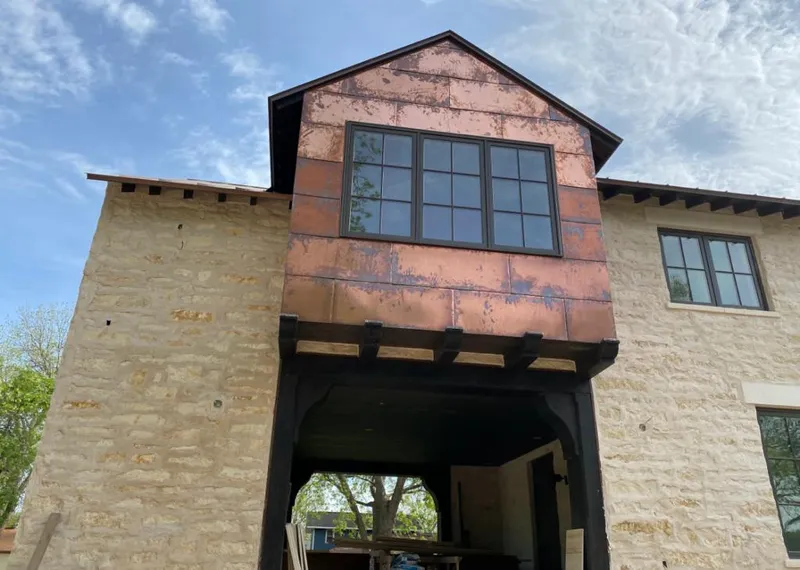 Copper metal panel facade on a stone building for Metal Roof Coating in Wailua Homesteads