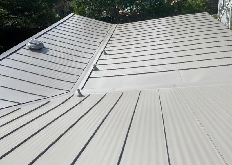 Solar attic fan installed on a metal roof for Roof Ventilation in Wailua Homesteads